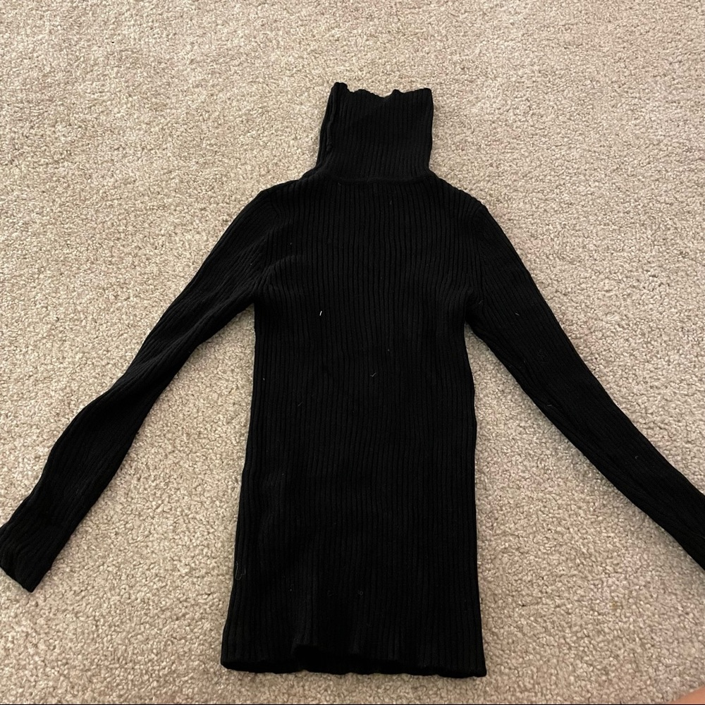 Black ribbed turtleneck; very stretchy fabric